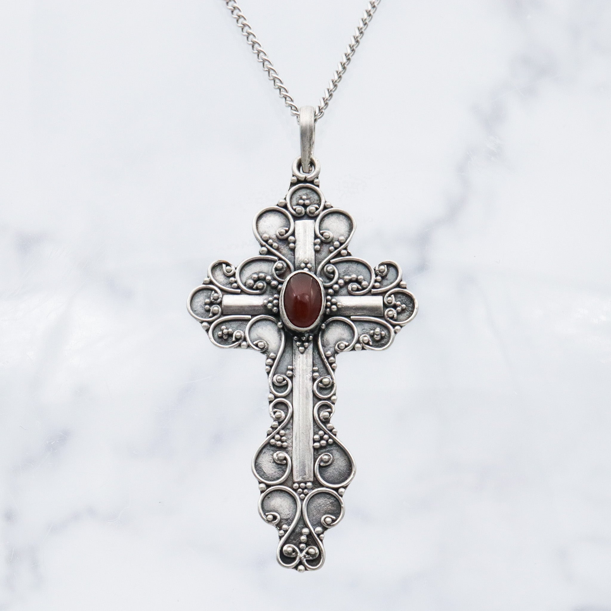 Vintage sterling silver & carnelian fancy scroll cross pendant